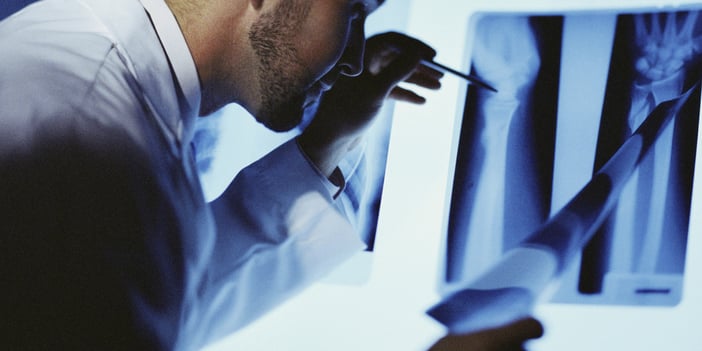 Doctor reviewing x-ray.png