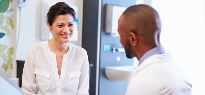 Female Patient And Doctor Have Consultation In Hospital Room-805258-edited.jpg