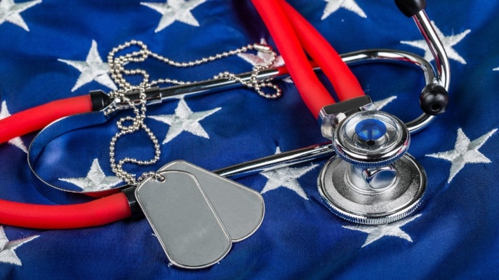 Stethoscope and dog tags on flag
