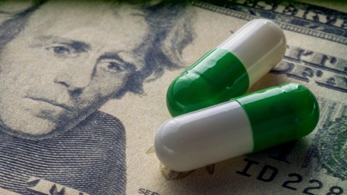 Capsules on Dollar Bill